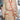 Floral patterned robe on a mannequin in a room with furniture and decor.